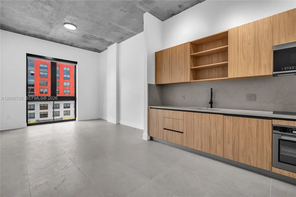 91 NW 27th St #403 Miami, FL 33127