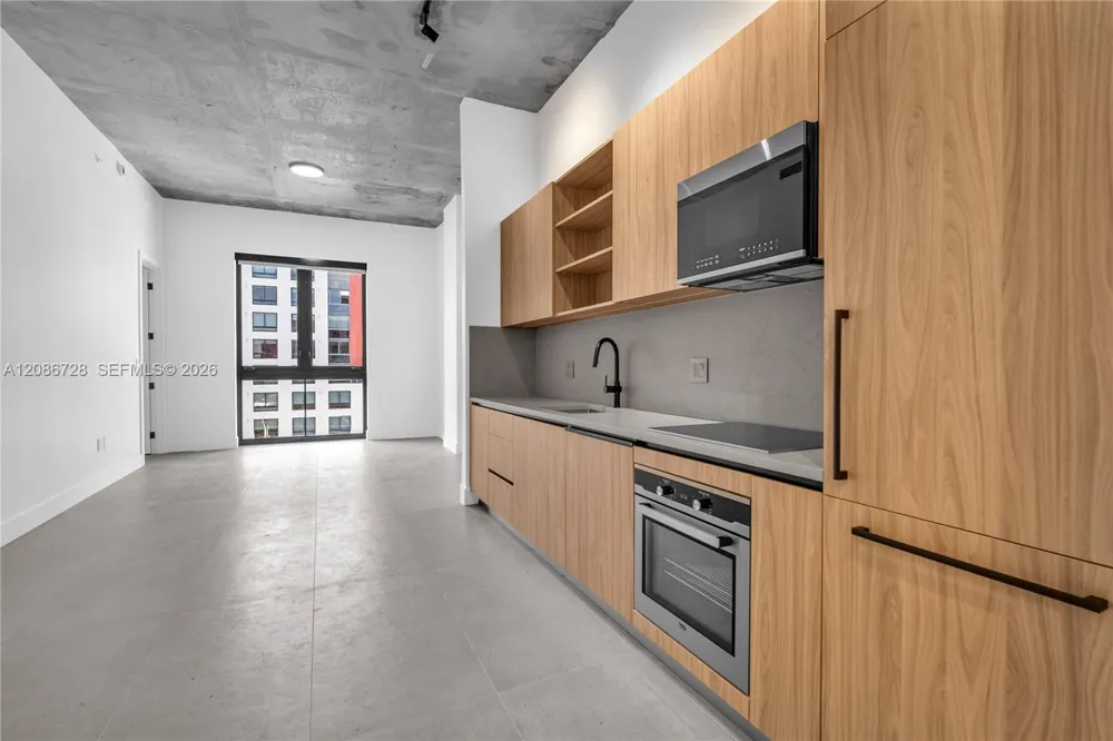 91 NW 27th St #403 Miami, FL 33127