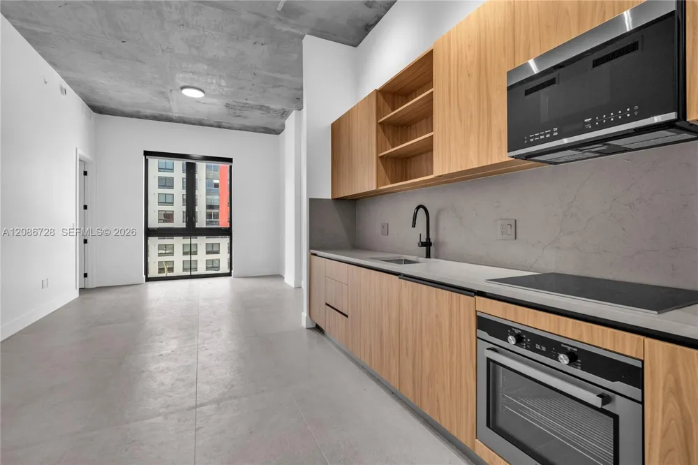 91 NW 27th St #403 Miami, FL 33127