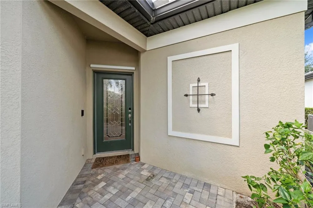 9086 Woodhurst Drive Naples, FL 34120