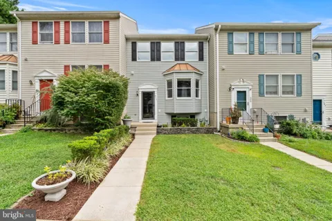 311 SLOPING WOODS COURT