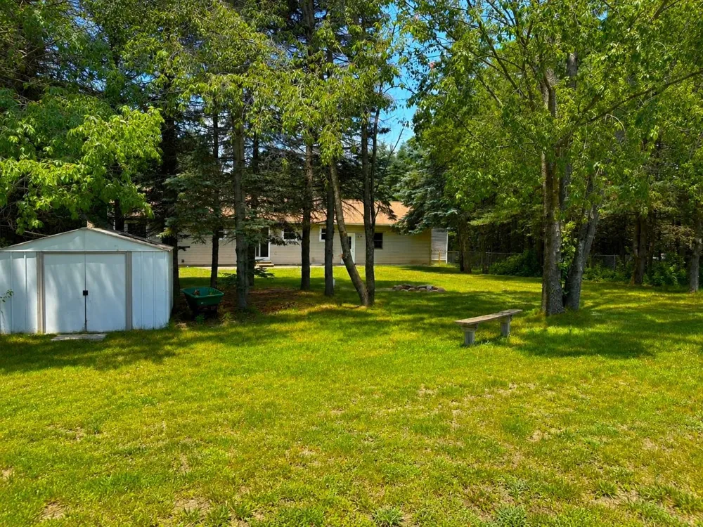 1401 Ryans Pond Green Lake Township, MI 49637