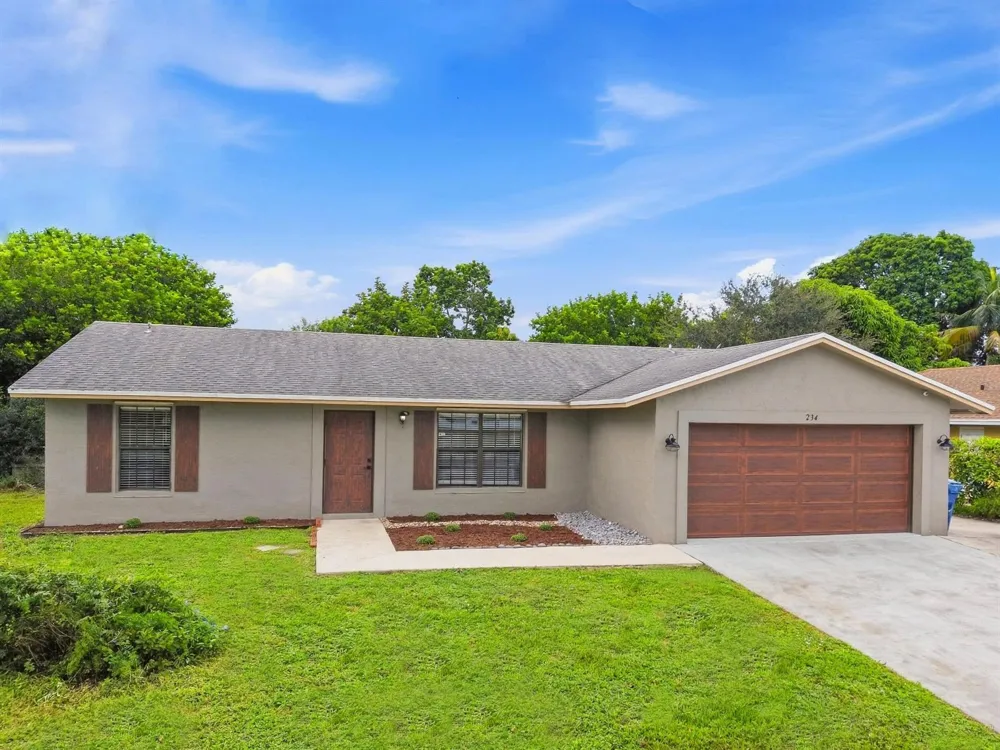 234 La Mancha Avenue Royal Palm Beach, FL 33411