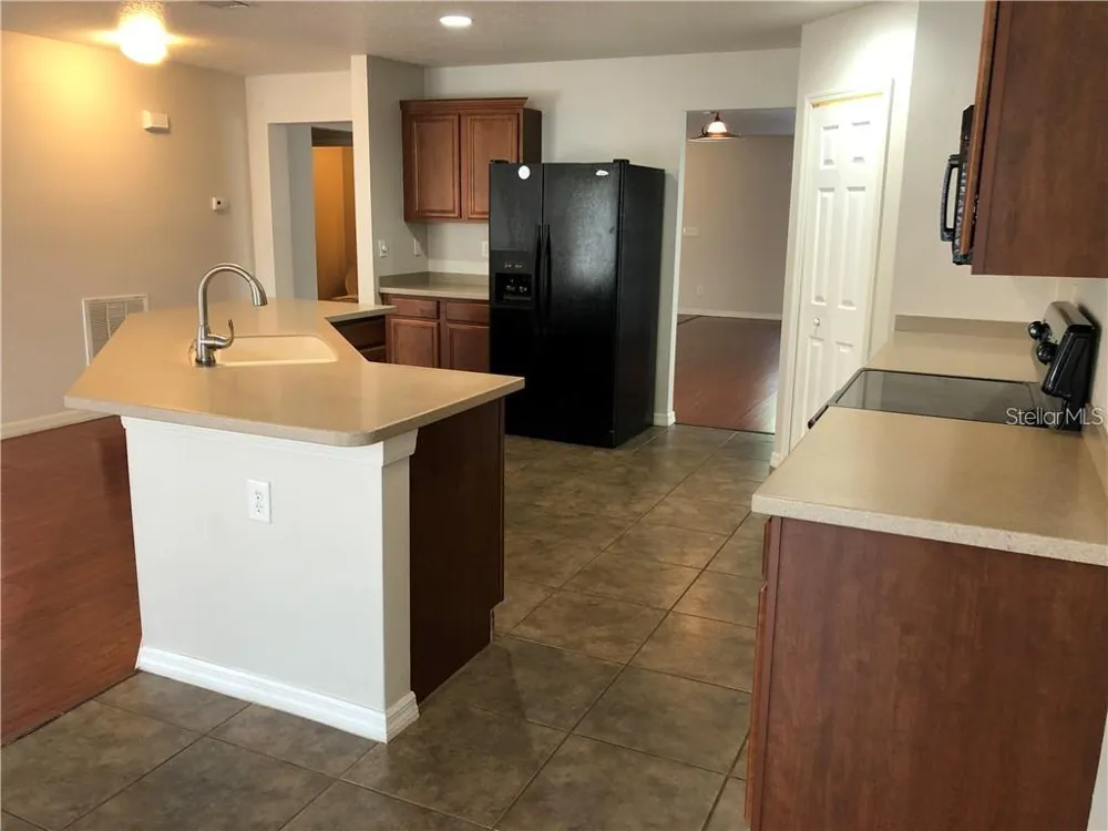 5116 CELLO WOOD LANE Wesley Chapel, FL 33543