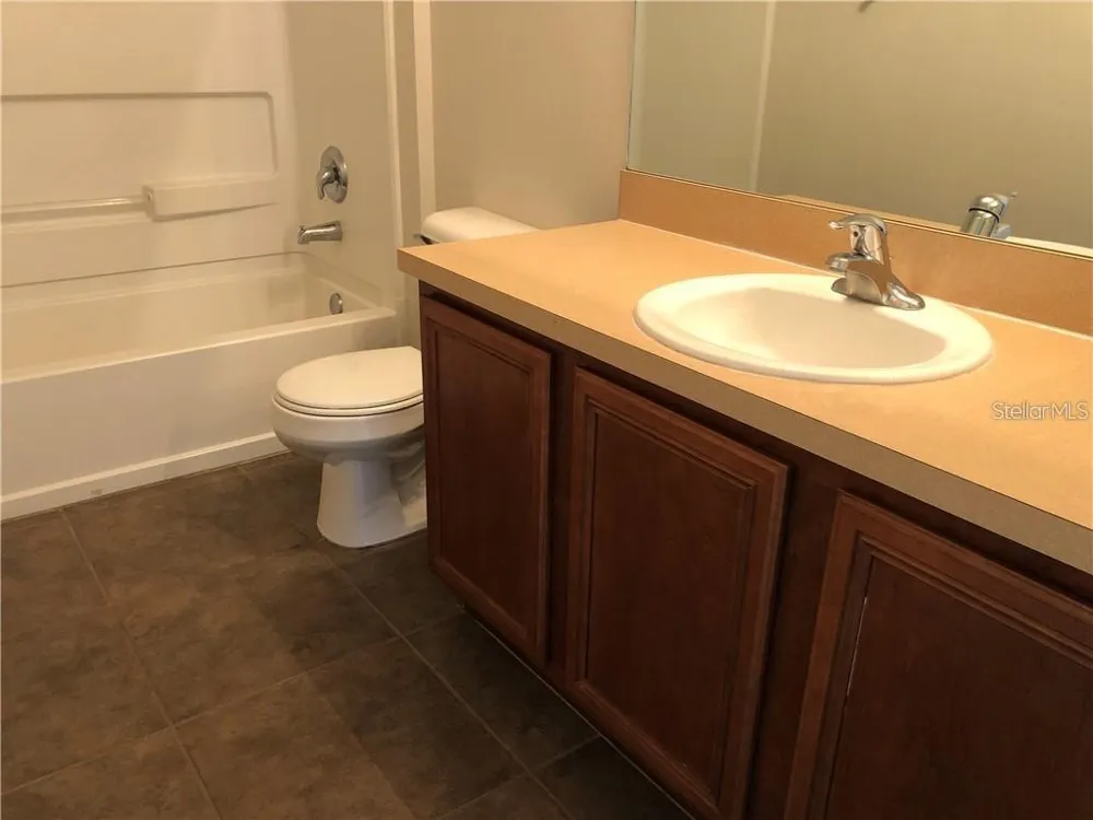 5116 CELLO WOOD LANE Wesley Chapel, FL 33543