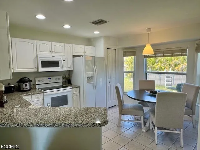 SW 13th Terrace Cape Coral, FL 33991