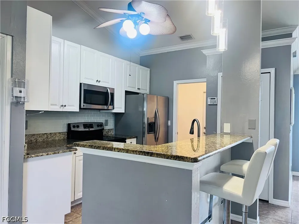 SW 15th Place Cape Coral, FL 33991