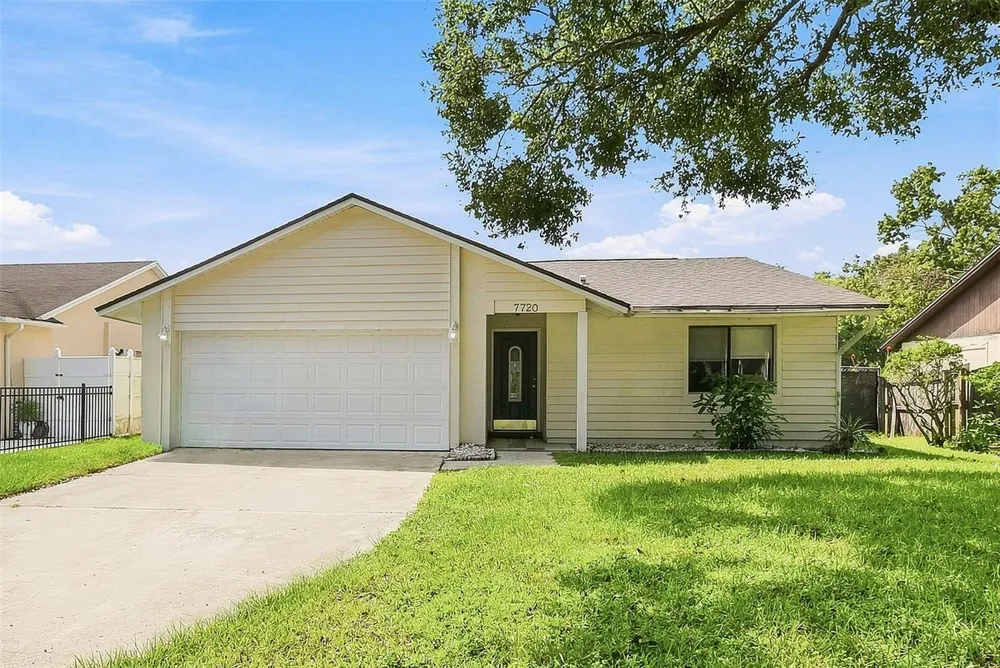 7720 LAKESIDE WOODS DRIVE Orlando, FL 32810
