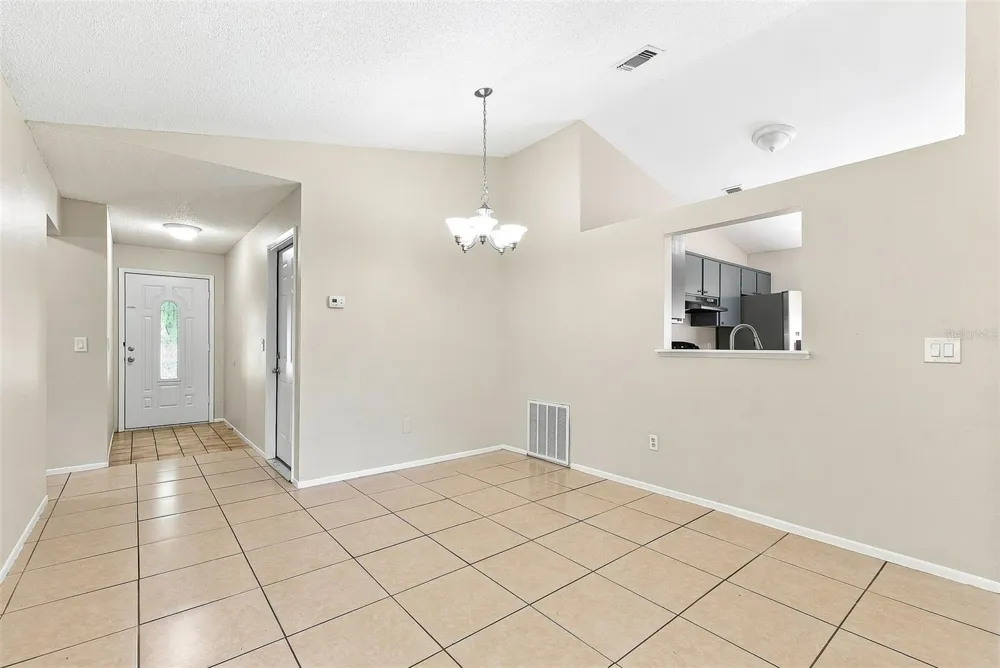 7720 LAKESIDE WOODS DRIVE Orlando, FL 32810