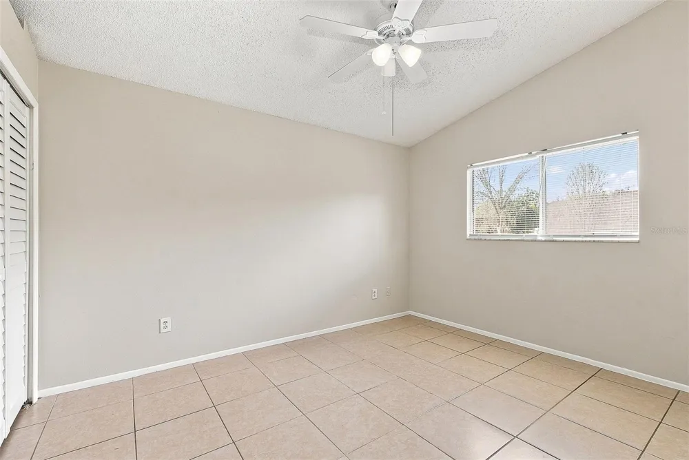 7720 LAKESIDE WOODS DRIVE Orlando, FL 32810