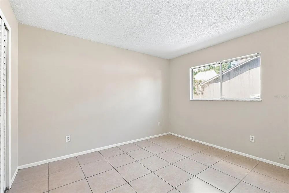 7720 LAKESIDE WOODS DRIVE Orlando, FL 32810