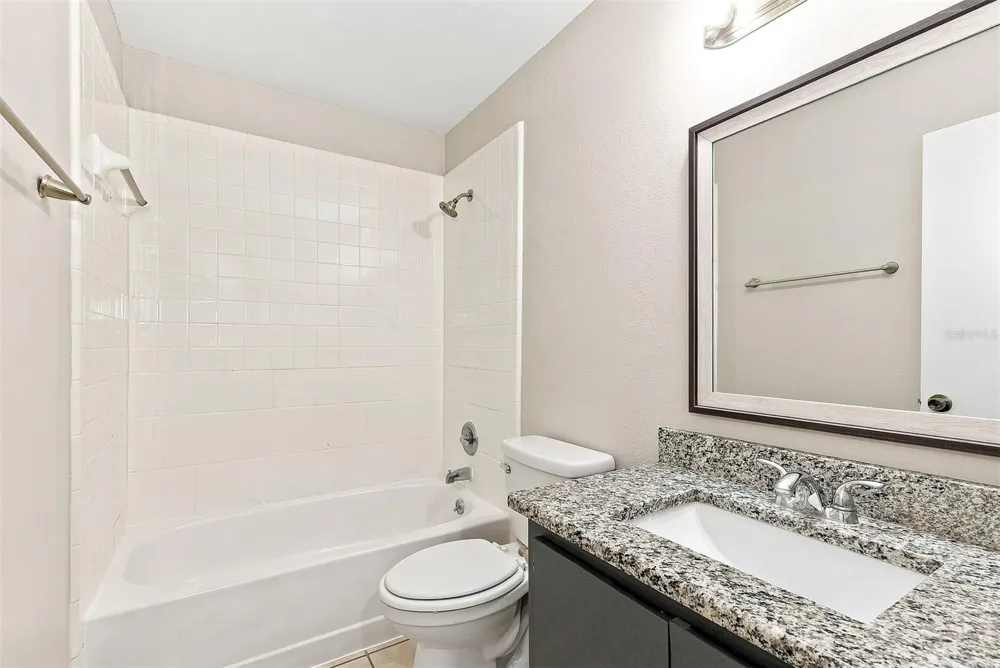7720 LAKESIDE WOODS DRIVE Orlando, FL 32810