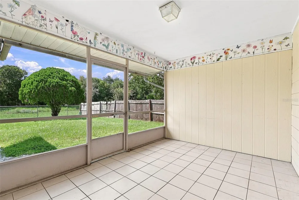 7720 LAKESIDE WOODS DRIVE Orlando, FL 32810