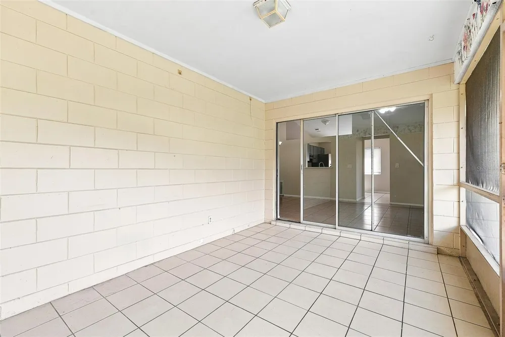 7720 LAKESIDE WOODS DRIVE Orlando, FL 32810