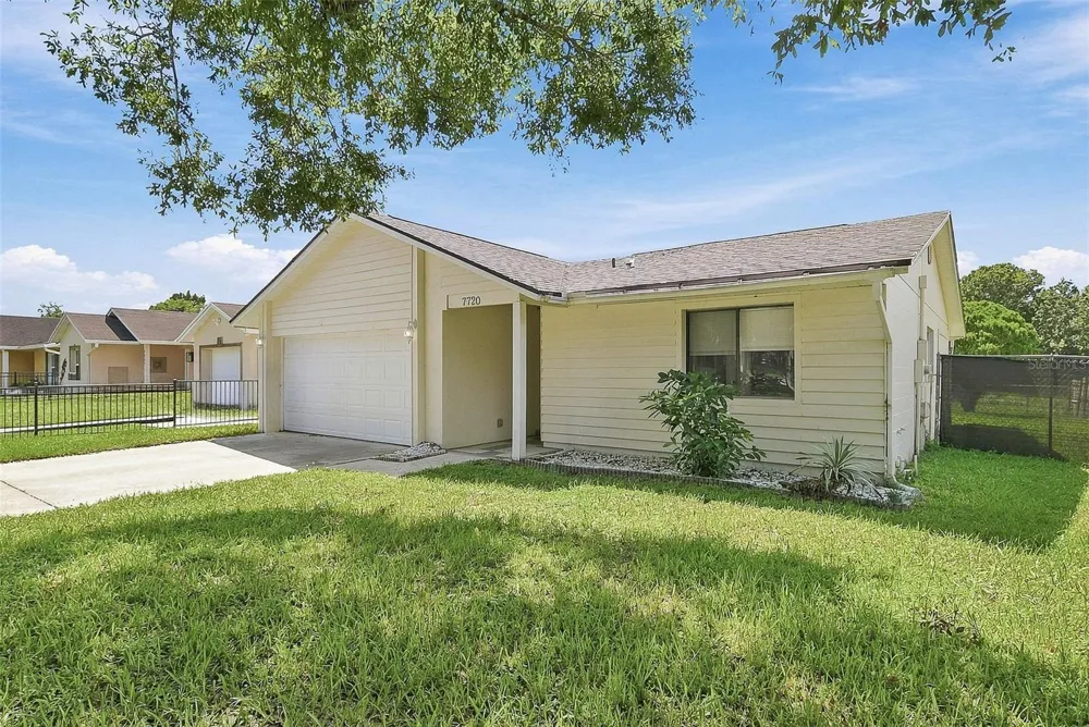 7720 LAKESIDE WOODS DRIVE Orlando, FL 32810