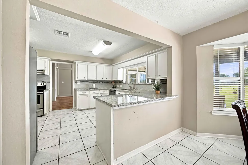 4697 Wickwillow Lane Alvin, TX 77511