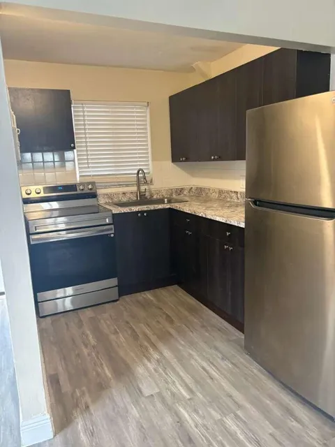 5811 NW 17TH PLACE #H