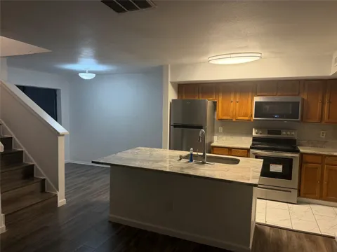 9805 Walnut Street #210