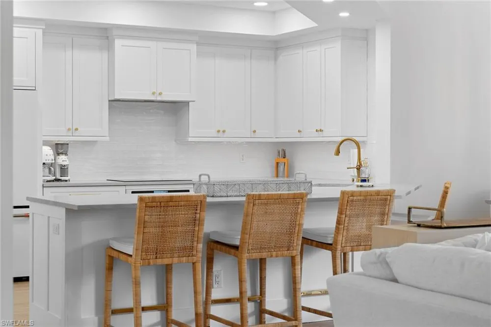 7016 Pelican Bay Boulevard #G202 Naples, FL 34108