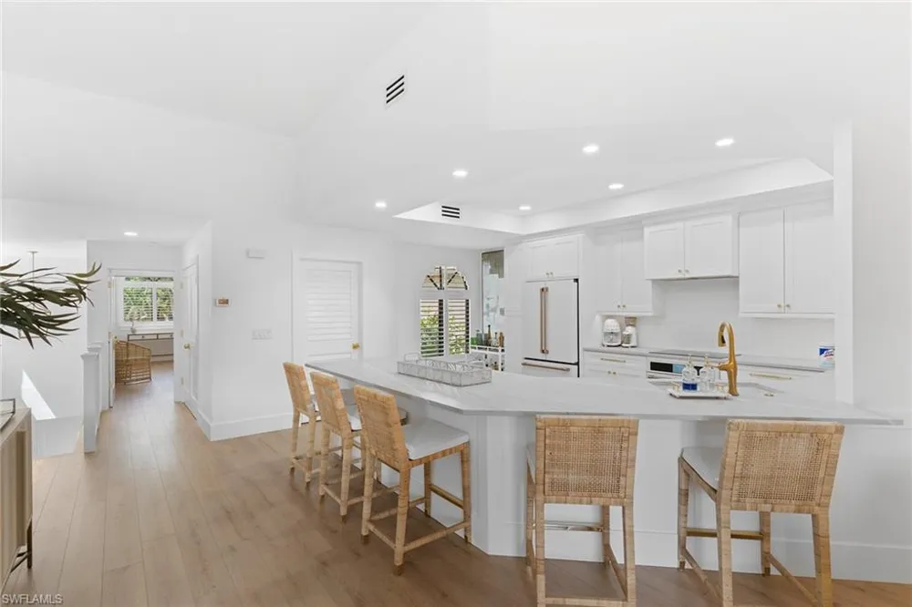 7016 Pelican Bay Boulevard #G202 Naples, FL 34108