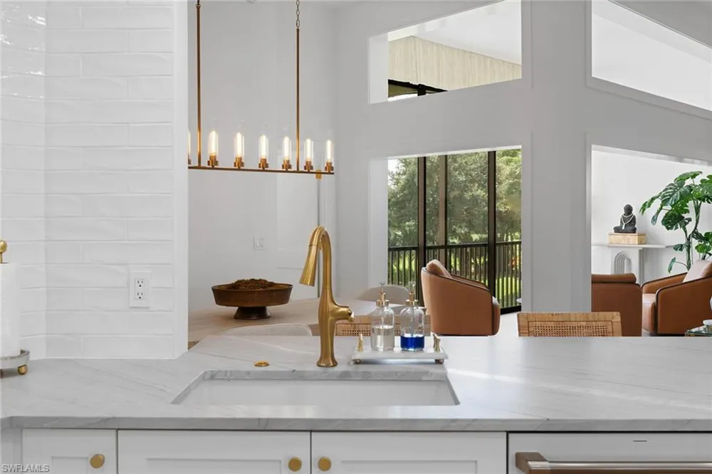 7016 Pelican Bay Boulevard #G202 Naples, FL 34108