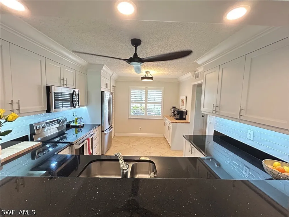 Dennis Circle #M103 Naples, FL 34104