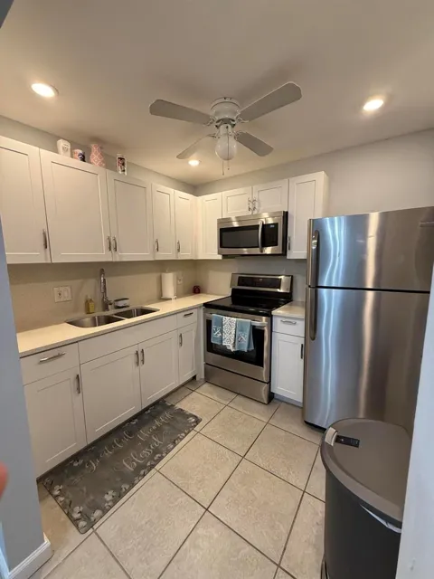 200 VILLAGE GREEN E #218