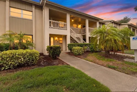 7143 WOOD CREEK DRIVE #203