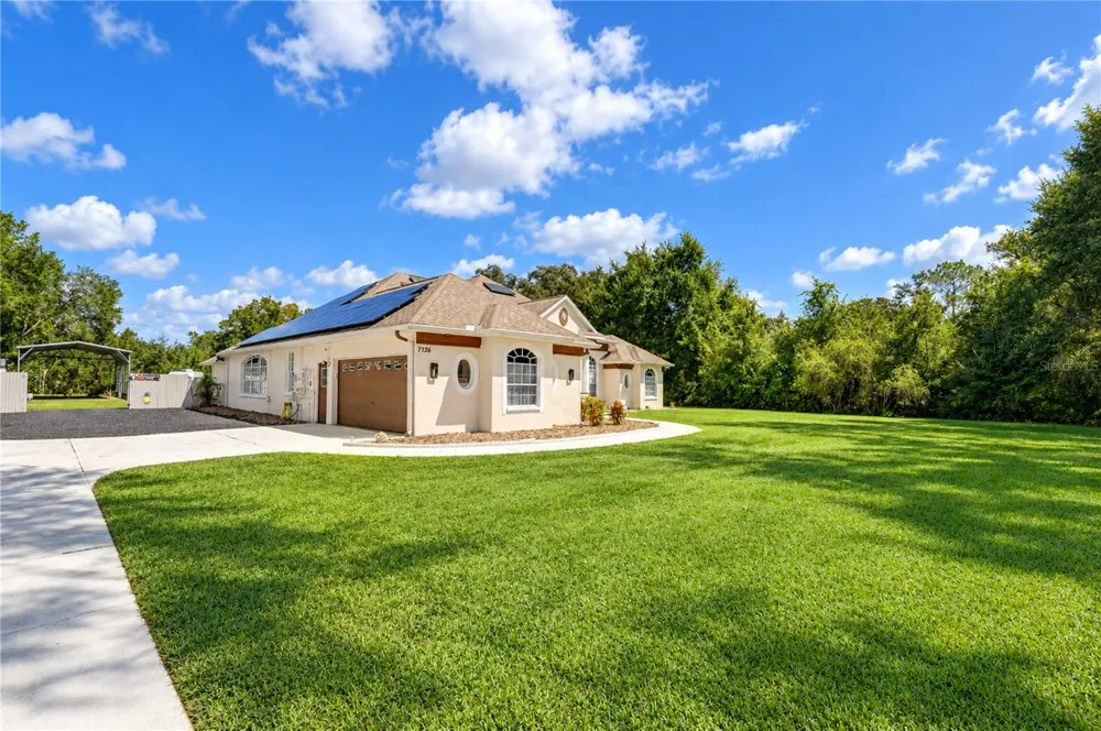7136 QUAIL HOLLOW BOULEVARD Wesley Chapel, FL 33544