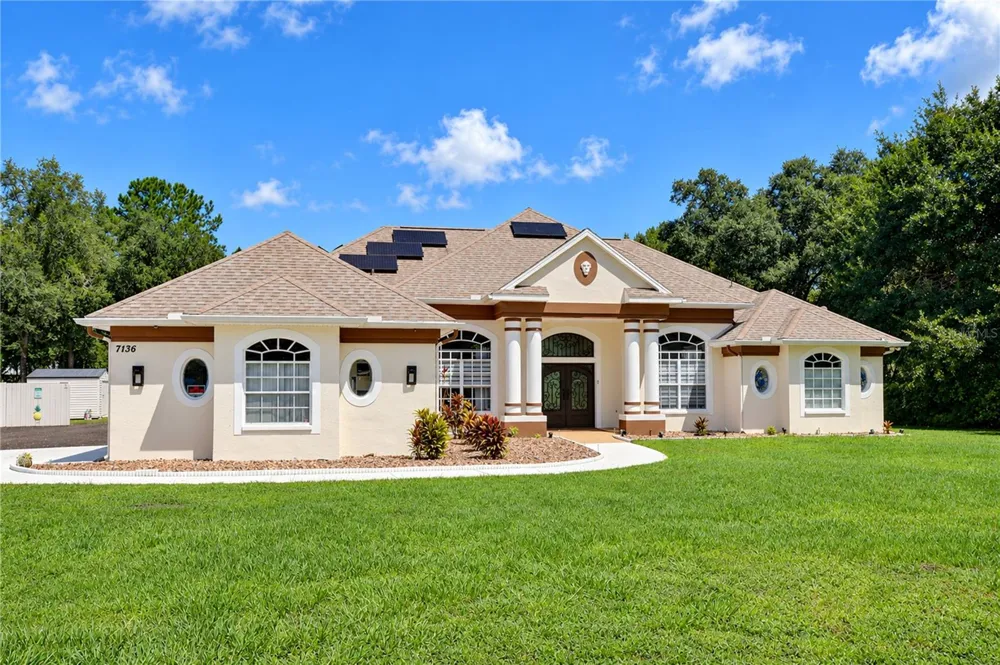 7136 QUAIL HOLLOW BOULEVARD Wesley Chapel, FL 33544