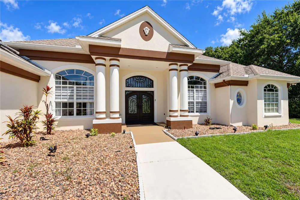7136 QUAIL HOLLOW BOULEVARD Wesley Chapel, FL 33544