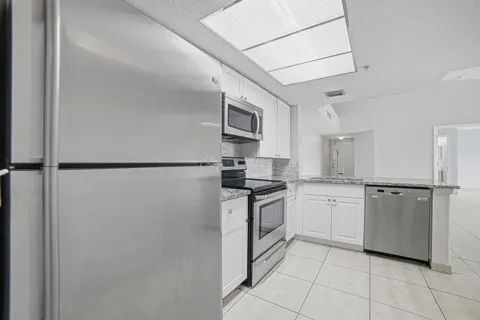 5045 WILES ROAD #308