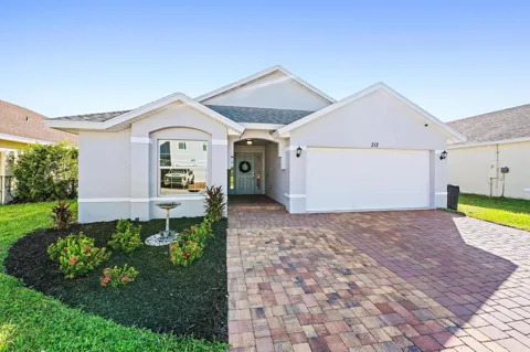 312 PALM BREEZES DRIVE