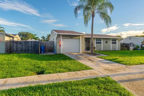 6911 SW 1ST COURT