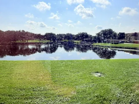 5380 WOODLAND LAKES DRIVE #216