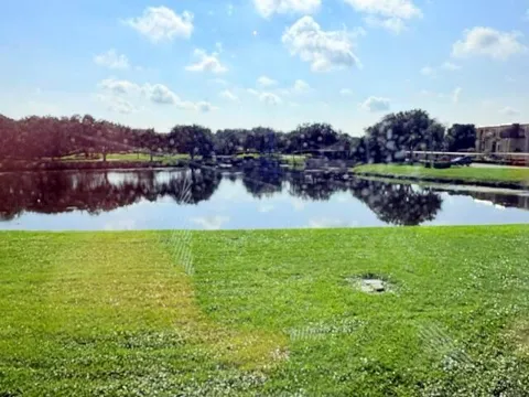 5380 WOODLAND LAKES DRIVE #216