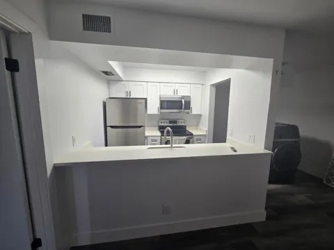 7197 GOLF COLONY COURT #104
