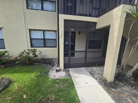 7197 GOLF COLONY COURT #104