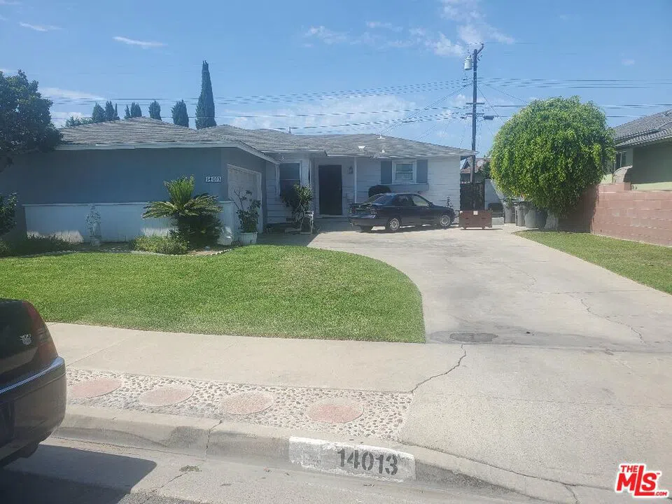 14013 S Casimir Avenue